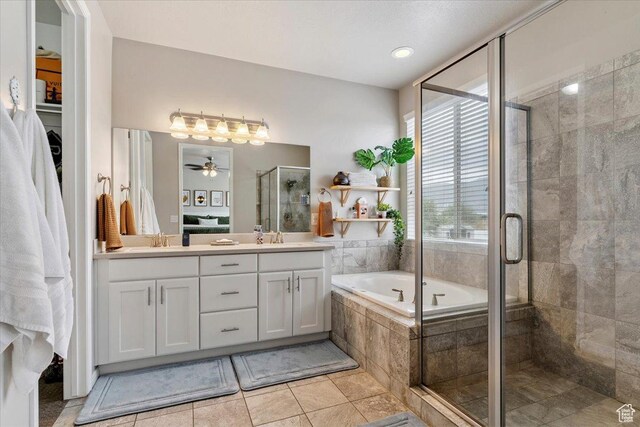 1820 W 950 N, Layton, UT 84041 - full bath featuring double vanity, a stall shower, a bath, ceiling fan, and tile patterned floors