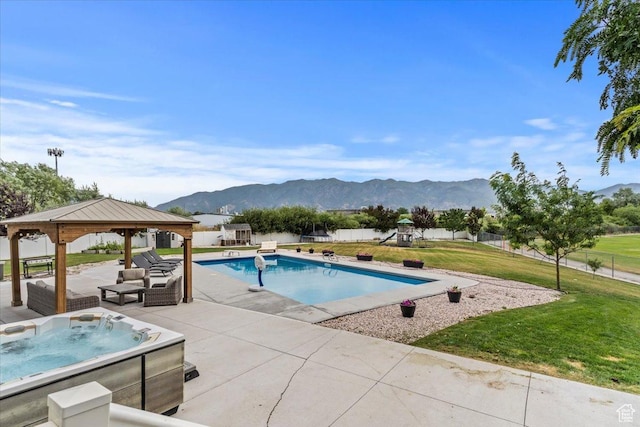 1820 W 950 N, Layton, UT 84041 - outdoor pool featuring a mountain view, a playground, a gazebo, a fenced backyard, and a hot tub
