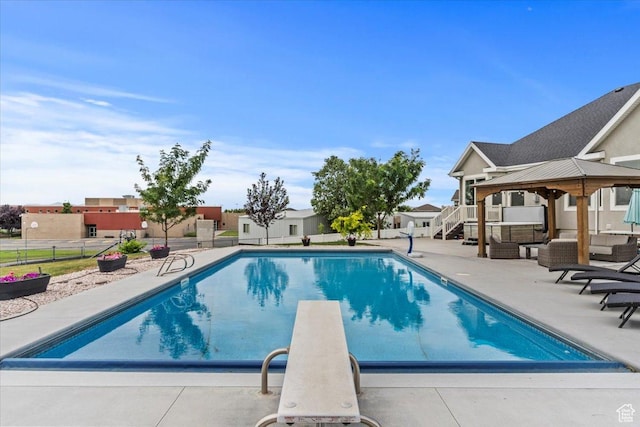 1820 W 950 N, Layton, UT 84041 - view of swimming pool with a gazebo, a patio area, a diving board, and an outdoor living space