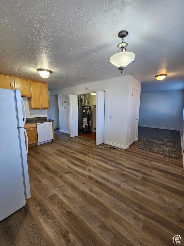 3673 S 2200 W Unit 15, West Valley City, UT 84119 - kitchen with white appliances, water heater, dark wood-style flooring, dark countertops, and a textured ceiling