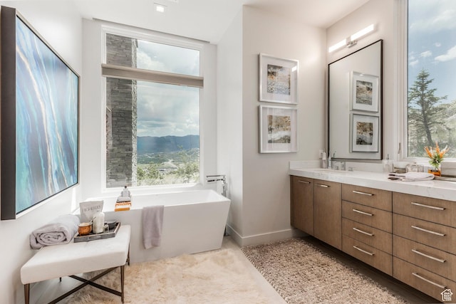 1433 Snow Berry St, Park City, UT 84098 - bathroom with double vanity, a soaking tub, and a mountain view