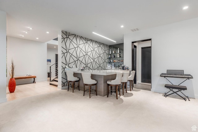 1433 Snow Berry St, Park City, UT 84098 - indoor wet bar featuring stairs, recessed lighting, and carpet flooring