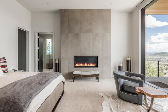 1433 Snow Berry St, Park City, UT 84098 - bedroom featuring carpet, multiple windows, a large fireplace, and access to exterior