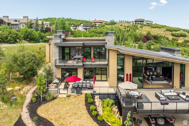 1433 Snow Berry St, Park City, UT 84098 - rear view of house with a balcony, a chimney, and a patio