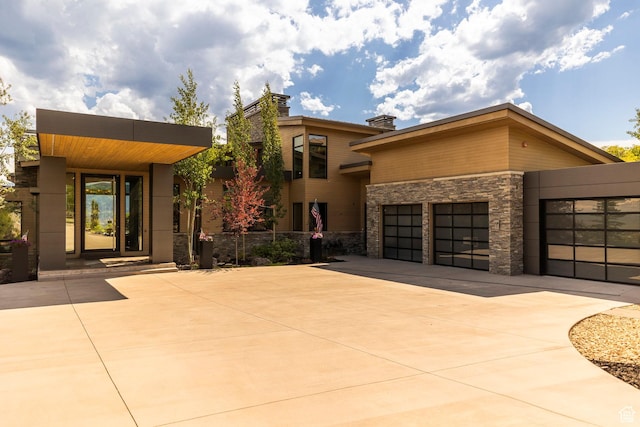 1433 Snow Berry St, Park City, UT 84098 - modern home with stone siding and driveway