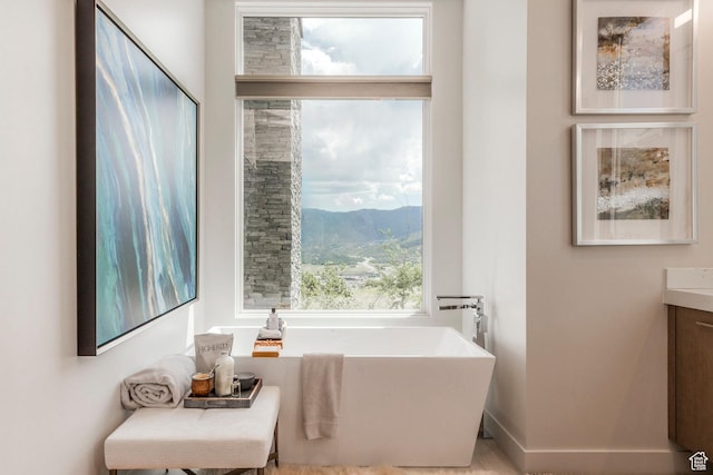 1433 Snow Berry St, Park City, UT 84098 - full bathroom featuring a freestanding bath, a mountain view, and vanity