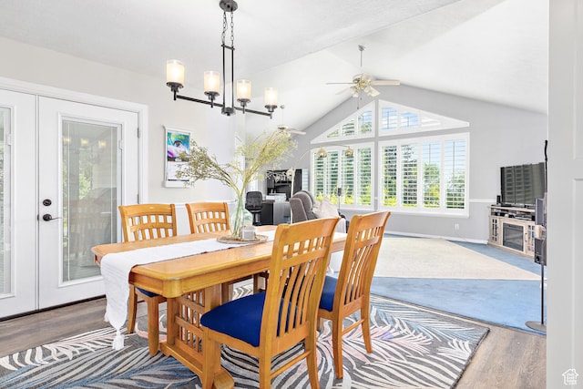 378 N 1180 E, Pleasant Grove, UT 84062 - dining room with french doors, wood finished floors, a ceiling fan, vaulted ceiling, and a chandelier