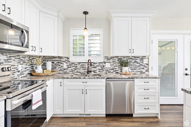 378 N 1180 E, Pleasant Grove, UT 84062 - kitchen featuring appliances with stainless steel finishes, dark wood finished floors, white cabinetry, and light stone counters