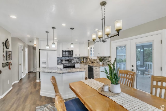 378 N 1180 E, Pleasant Grove, UT 84062 - dining area featuring french doors, dark wood finished floors, and recessed lighting