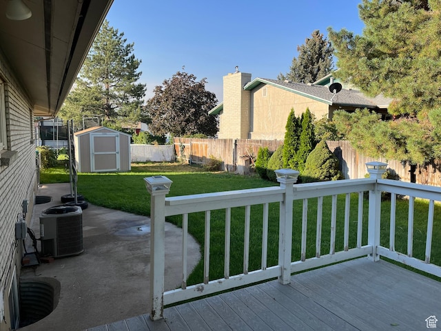 290 S 300 E, Orem, UT 84058 - wooden deck featuring a storage shed, a fenced backyard, and a patio area