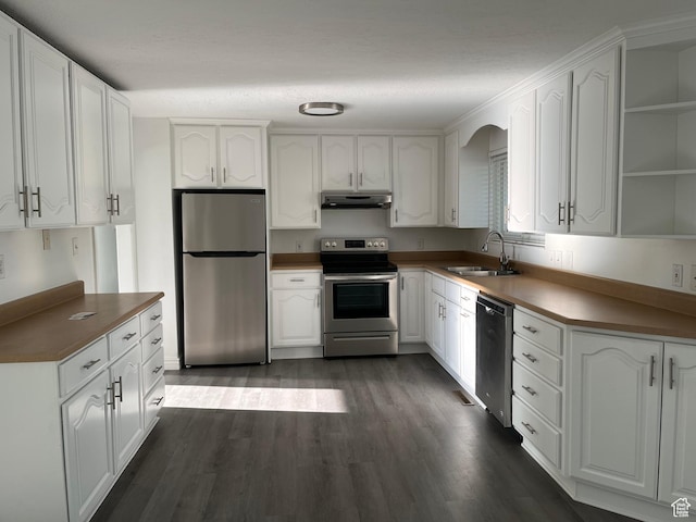 290 S 300 E, Orem, UT 84058 - kitchen featuring appliances with stainless steel finishes, under cabinet range hood, dark wood-type flooring, white cabinets, and open shelves