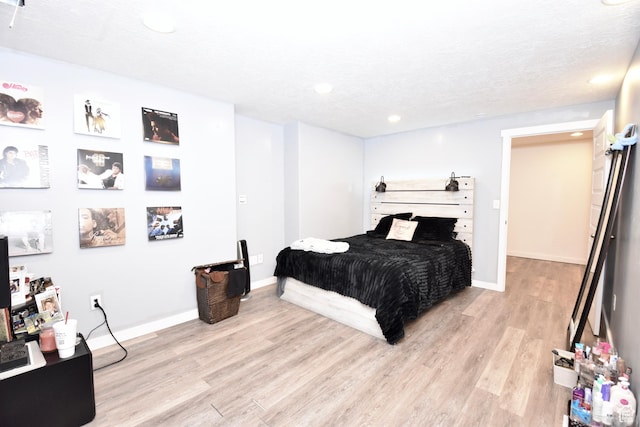 5063 W Arete Way, Herriman, UT 84096 - bedroom featuring light wood-type flooring, recessed lighting, and a textured ceiling