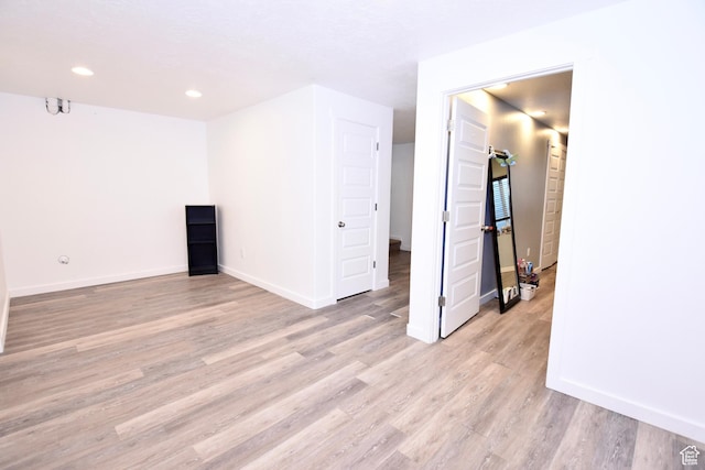5063 W Arete Way, Herriman, UT 84096 - empty room featuring light wood-style floors and recessed lighting