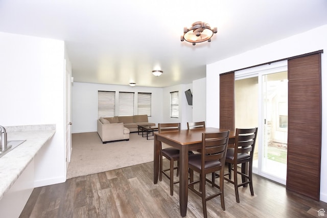 5063 W Arete Way, Herriman, UT 84096 - dining room with dark wood finished floors and healthy amount of natural light