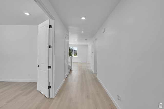 3362 S Zigzag Heron Dr Unit 813, Saratoga Springs, UT 84045 - hallway featuring light wood-type flooring and recessed lighting