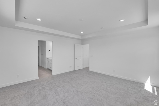 3362 S Zigzag Heron Dr Unit 813, Saratoga Springs, UT 84045 - unfurnished bedroom featuring a raised ceiling, carpet, recessed lighting, and connected bathroom