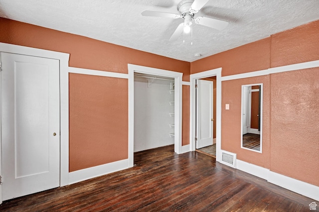 420 E 400 N, Logan, UT 84321 - unfurnished bedroom with a textured wall, hardwood / wood-style flooring, a textured ceiling, and a ceiling fan