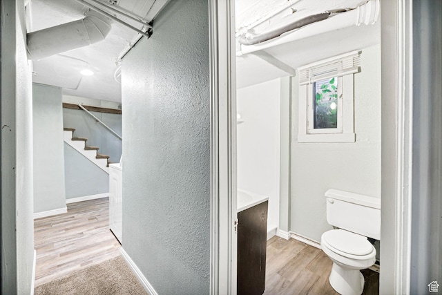 420 E 400 N, Logan, UT 84321 - bathroom featuring wood finished floors and a textured wall