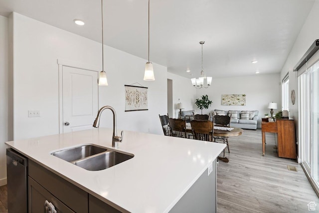 526 W 1360 N, Tooele, UT 84074 - kitchen with stainless steel dishwasher, light wood-style flooring, light countertops, and recessed lighting