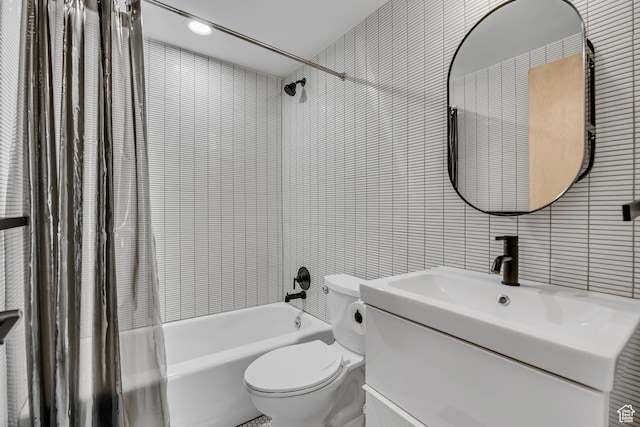 673 E 6th Ave, Salt Lake City, UT 84103 - bathroom with tile walls, shower / bath combo, and vanity