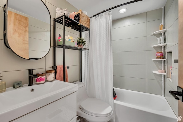673 E 6th Ave, Salt Lake City, UT 84103 - bathroom featuring vanity, shower / bath combo, and recessed lighting