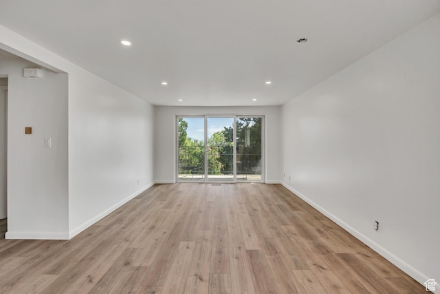 673 E 6th Ave, Salt Lake City, UT 84103 - empty room featuring light wood-style floors and recessed lighting