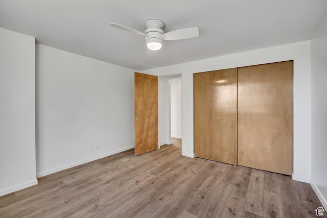 673 E 6th Ave, Salt Lake City, UT 84103 - unfurnished bedroom featuring wood finished floors, a closet, and a ceiling fan