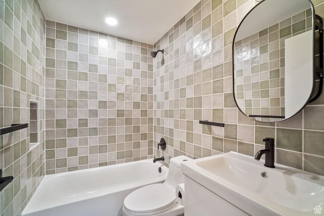 673 E 6th Ave, Salt Lake City, UT 84103 - bathroom featuring tile walls, tub / shower combination, vanity, and recessed lighting
