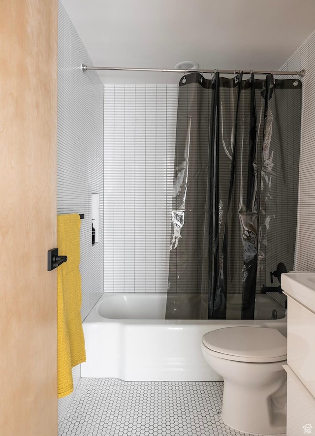 673 E 6th Ave, Salt Lake City, UT 84103 - bathroom featuring shower / tub combo with curtain, vanity, and tile patterned flooring