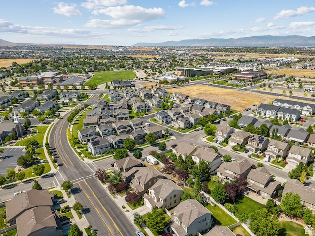 13159 S Herriman Rose Blvd, Herriman, UT 84096 - aerial overview of property's location featuring a mountain backdrop and nearby suburban area