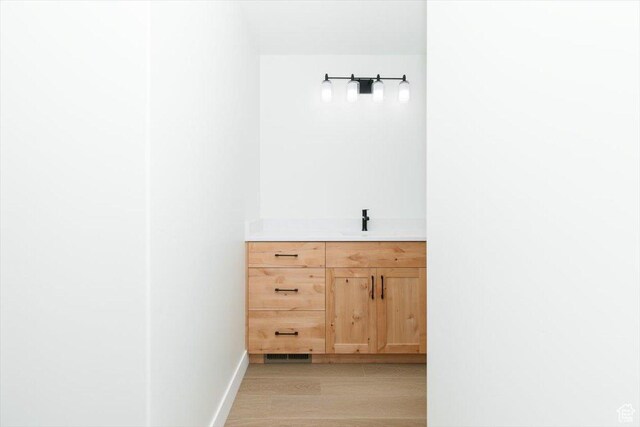 821 E 160 N, Hyde Park, UT 84318 - bathroom with vanity and wood finished floors