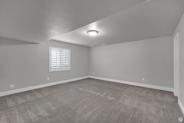 5575 S 1350 E, South Ogden, UT 84403 - additional living space with a textured ceiling and carpet