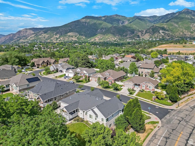 5575 S 1350 E, South Ogden, UT 84403 - aerial overview of property's location with a mountainous background and nearby suburban area