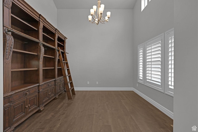 5575 S 1350 E, South Ogden, UT 84403 - empty room with a chandelier and dark wood finished floors