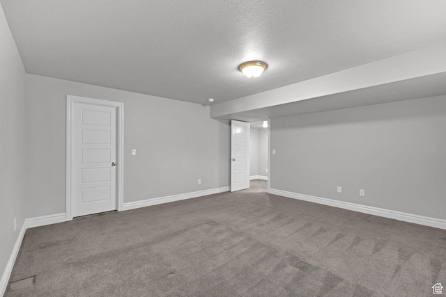 5575 S 1350 E, South Ogden, UT 84403 - finished basement featuring dark carpet and a textured ceiling