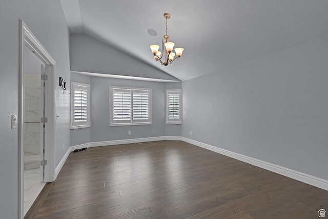 5575 S 1350 E, South Ogden, UT 84403 - spare room featuring lofted ceiling, a chandelier, and dark wood-type flooring