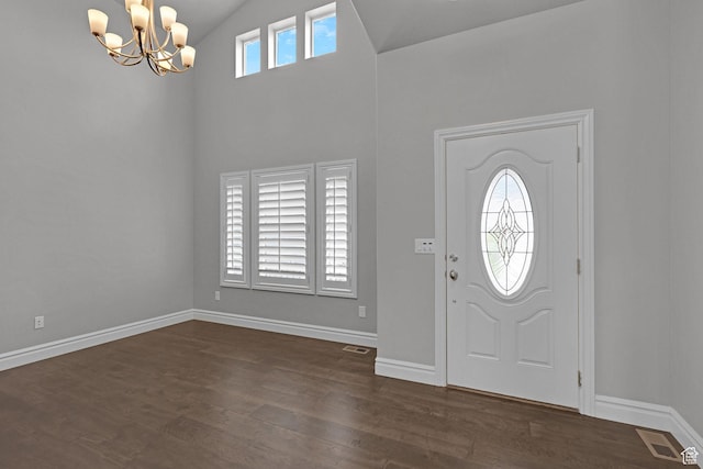 5575 S 1350 E, South Ogden, UT 84403 - foyer entrance featuring a chandelier, dark wood-style floors, and high vaulted ceiling