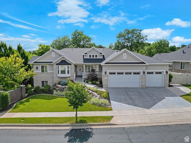 5575 S 1350 E, South Ogden, UT 84403 - craftsman house featuring a garage, driveway, stone siding, stucco siding, and roof with shingles