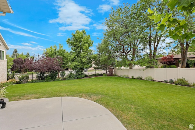 5575 S 1350 E, South Ogden, UT 84403 - fenced backyard with a patio