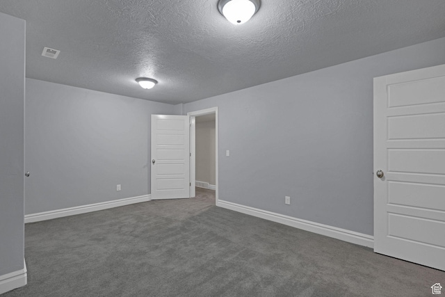 5575 S 1350 E, South Ogden, UT 84403 - spare room featuring a textured ceiling and carpet floors