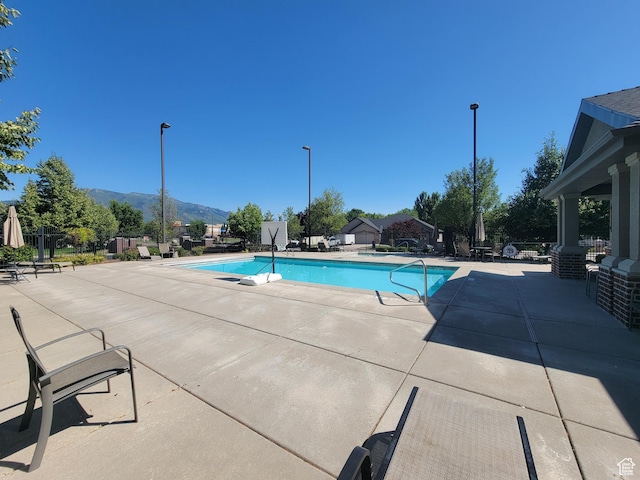 5575 S 1350 E, South Ogden, UT 84403 - community pool with a mountain view and a patio area