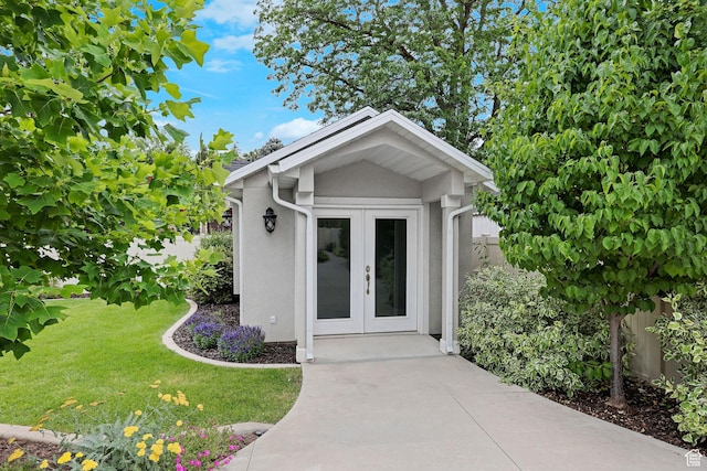 5575 S 1350 E, South Ogden, UT 84403 - doorway to property featuring french doors, stucco siding, and a yard