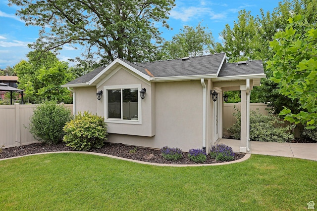 5575 S 1350 E, South Ogden, UT 84403 - view of home's exterior featuring stucco siding and a shingled roof