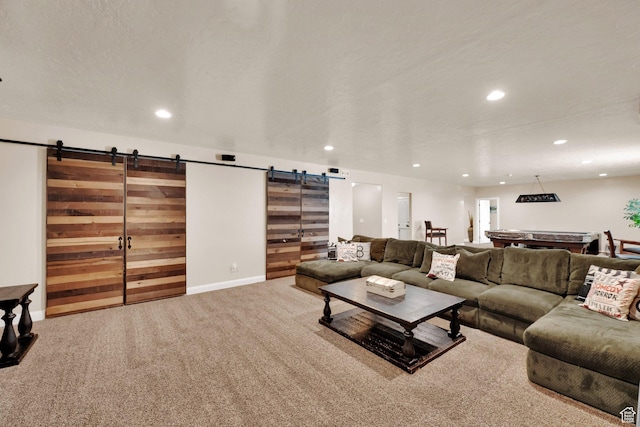 4390 N Diamond Ln, Erda, UT 84074 - carpeted living room featuring a barn door and recessed lighting