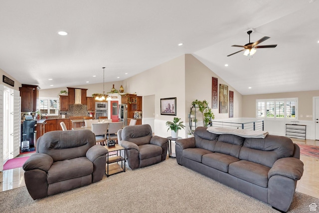 4390 N Diamond Ln, Erda, UT 84074 - living room with vaulted ceiling, a chandelier, a ceiling fan, and recessed lighting