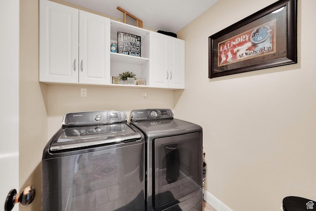 4390 N Diamond Ln, Erda, UT 84074 - laundry area with separate washer and dryer and cabinet space