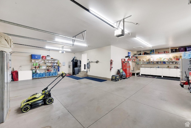4390 N Diamond Ln, Erda, UT 84074 - garage featuring a garage door opener