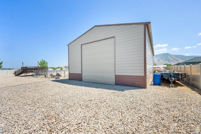 4390 N Diamond Ln, Erda, UT 84074 - garage featuring a mountain view