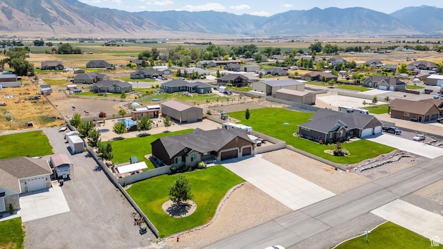 4390 N Diamond Ln, Erda, UT 84074 - aerial perspective of suburban area with mountains