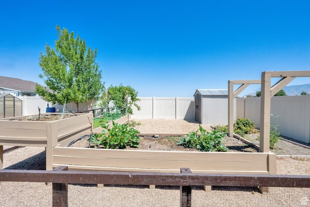 4390 N Diamond Ln, Erda, UT 84074 - fenced backyard featuring a vegetable garden and a shed
